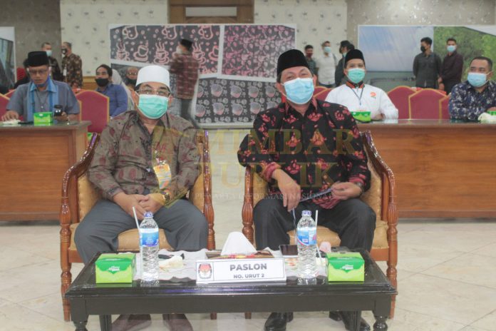 Drs. KH. Anwar Sadat, M.Ag dan Hairan, SH