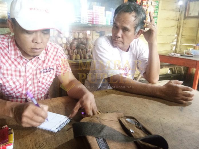 Kepala desa Portibi Lama saat di komfirmasi mengenai lahan yang di peruntunkan untuk korban erupsi sinabung